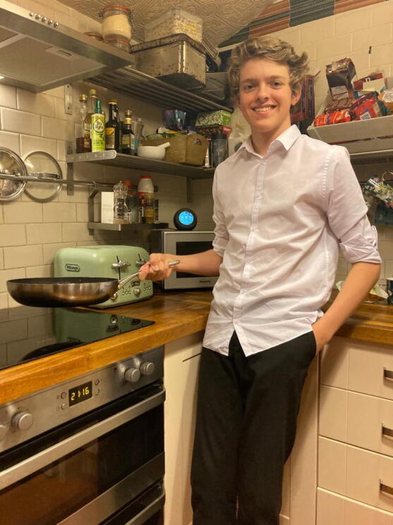 Harrison with a cooking pan