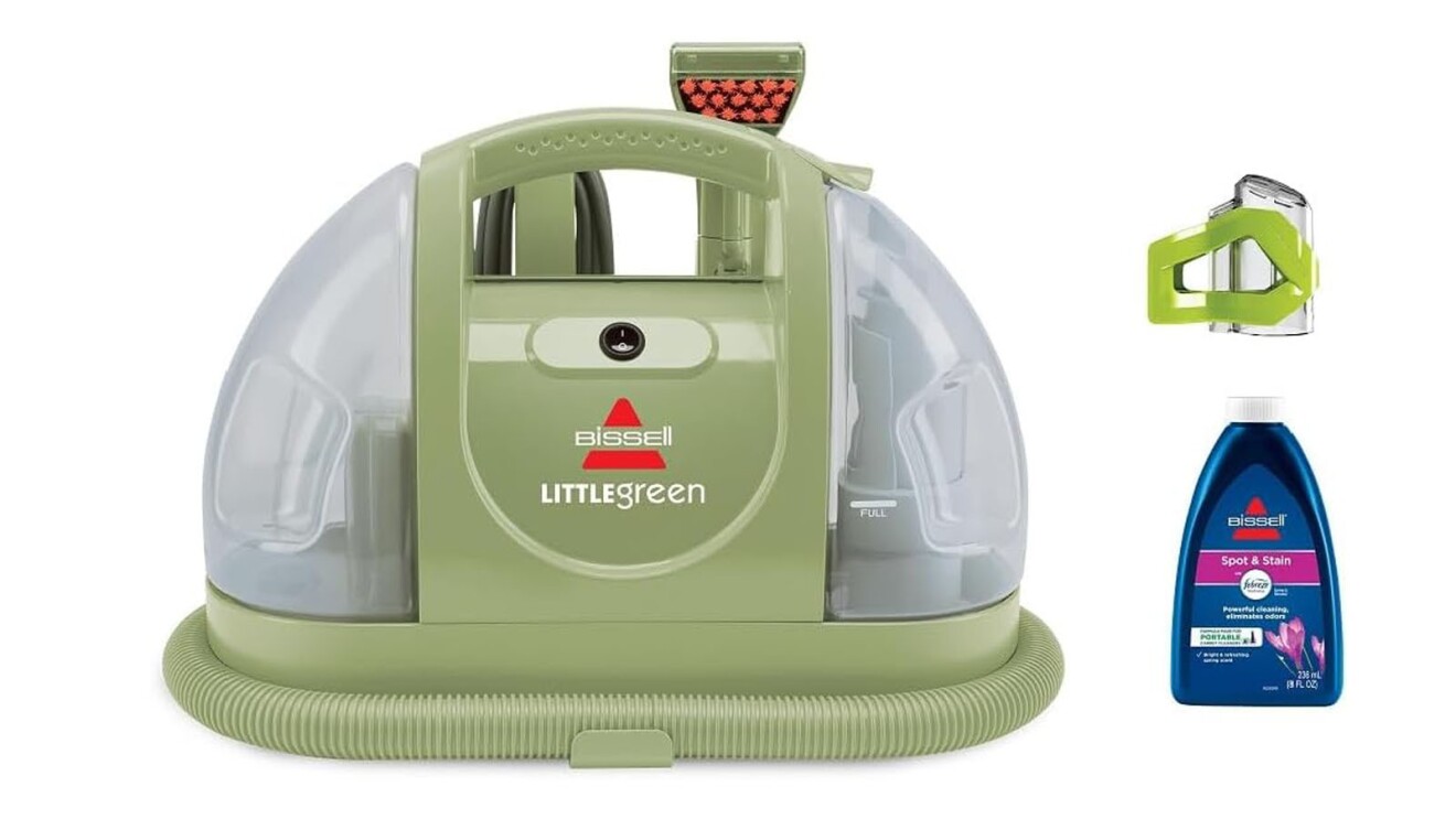 An image of a small, green vacuum with the Bissell logo on the front.