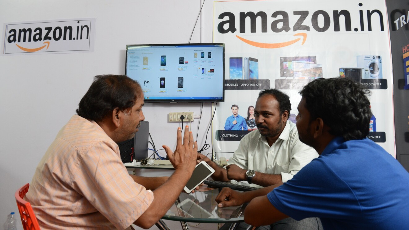 An Udaan point with a customer