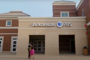 A photo of the entrance of the PBS headquarters in Arlington, Virginia.