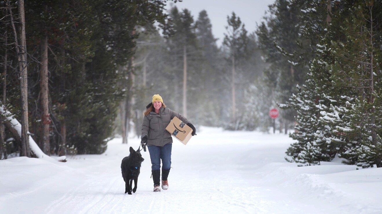 An image of Amazon packages being delivered to Yellowstone National Park in the winter.