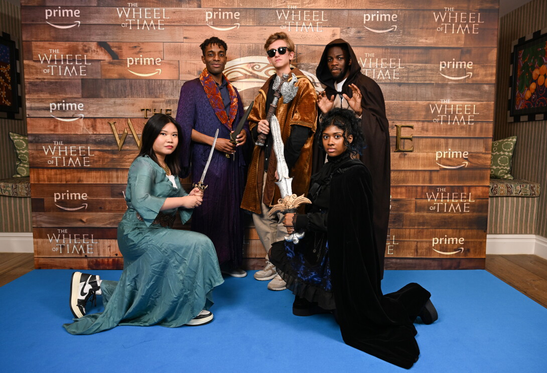 Four fans in cosplay at the wheel of time screening 