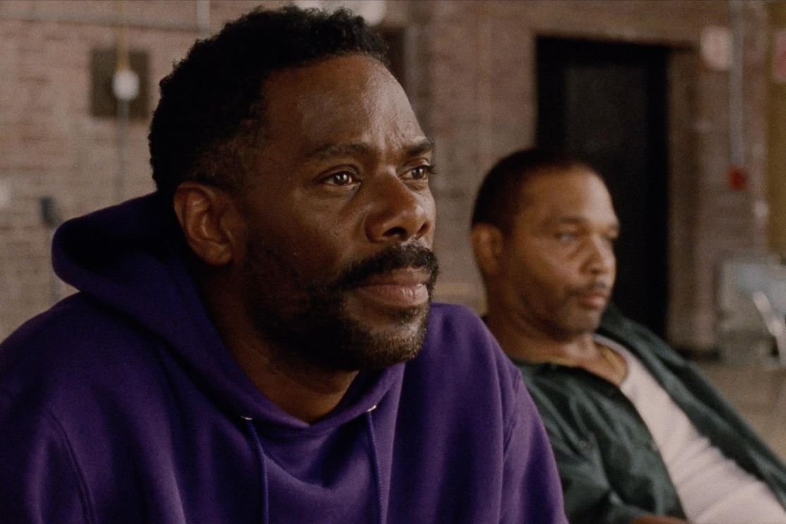 Two men stare into the distance in a scene from the oscar nominated film Sing Sing