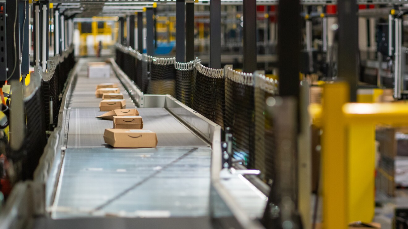 Photo of packages running along a conveyor belt