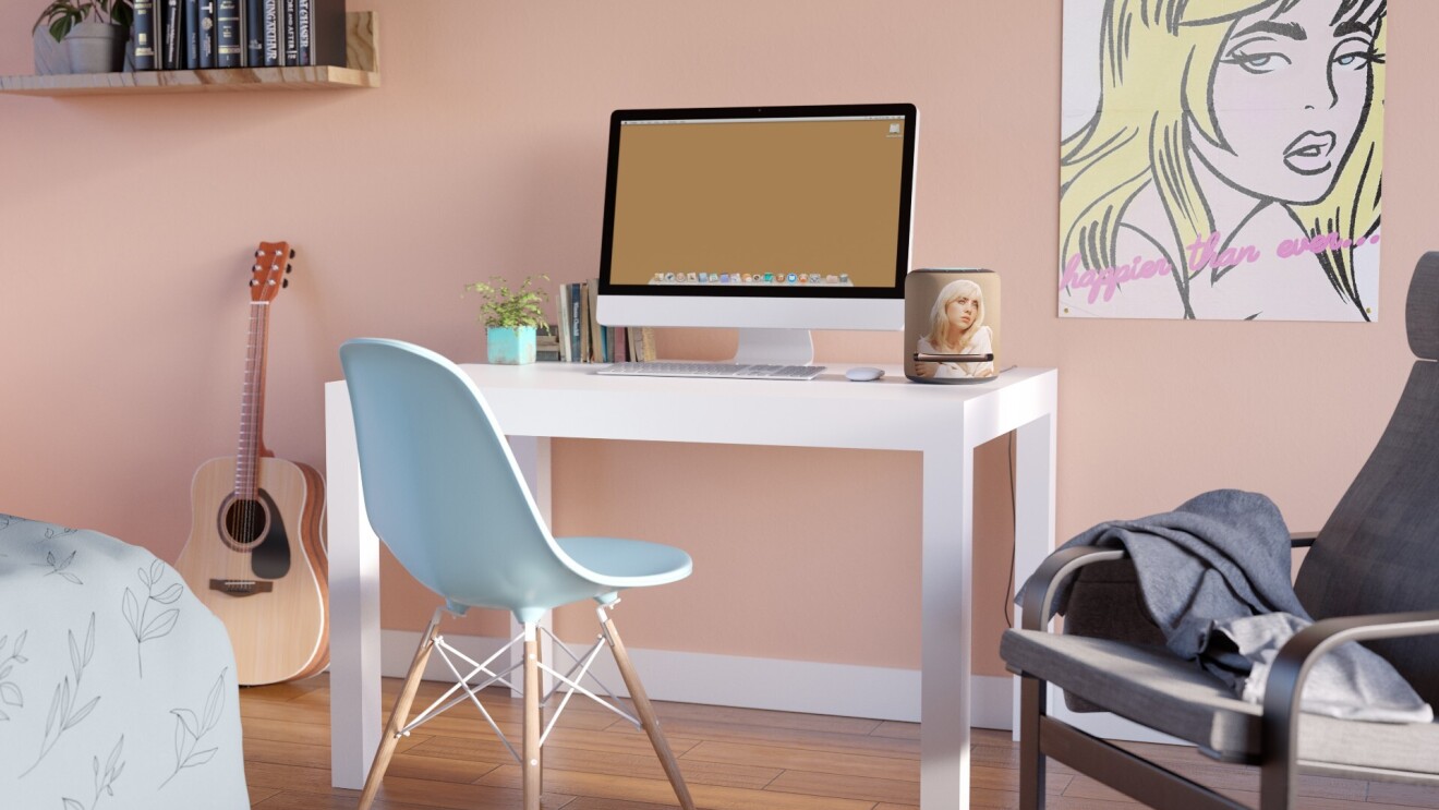 A Billie Eilish Limited-Edition Echo Studio sits on a desk in a bedroom.