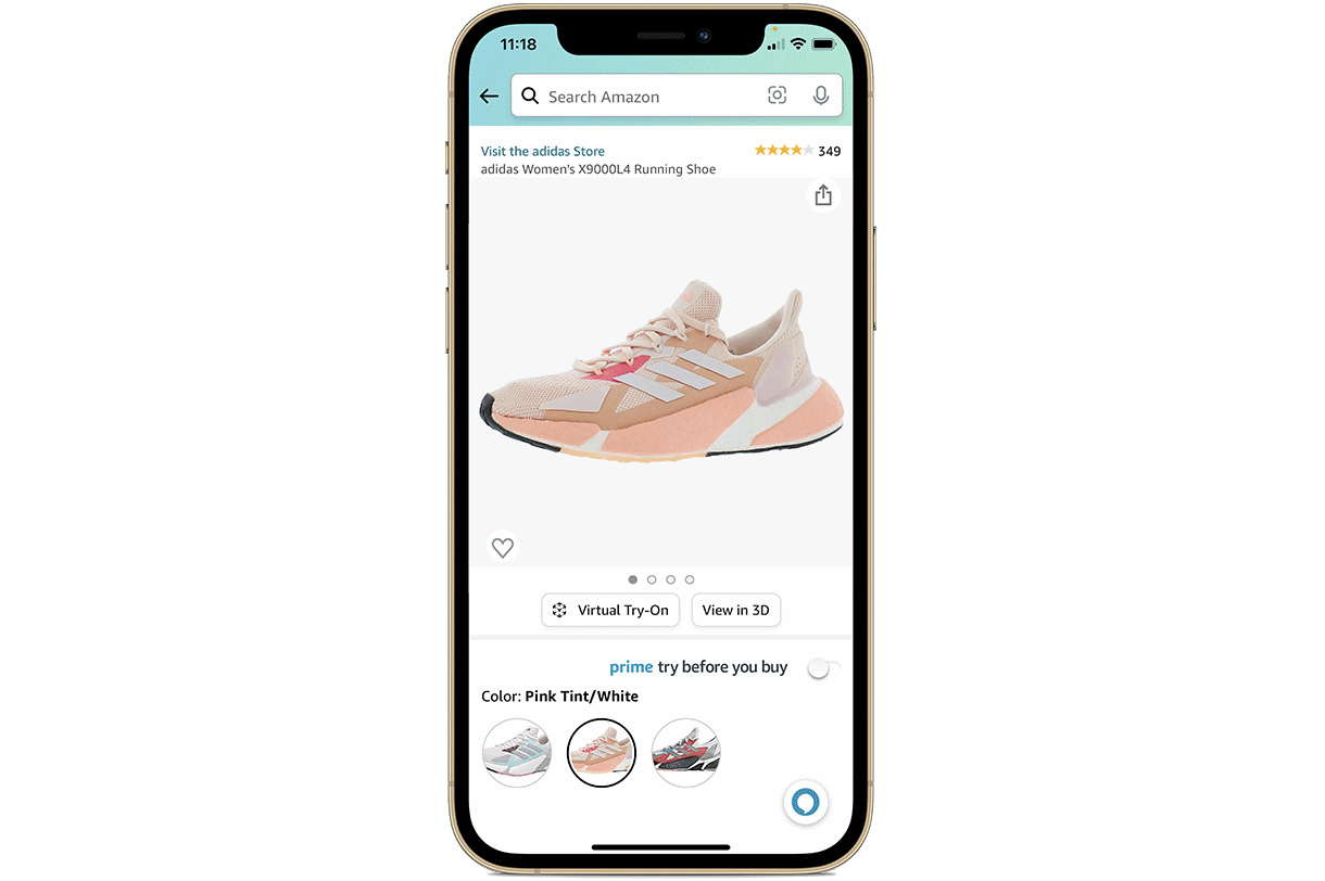 An animated GIF showing the process of using the virtual try-on feature to try a pair of pink adiddas sneakers in the Amazon Shopping app on a mobile phone.