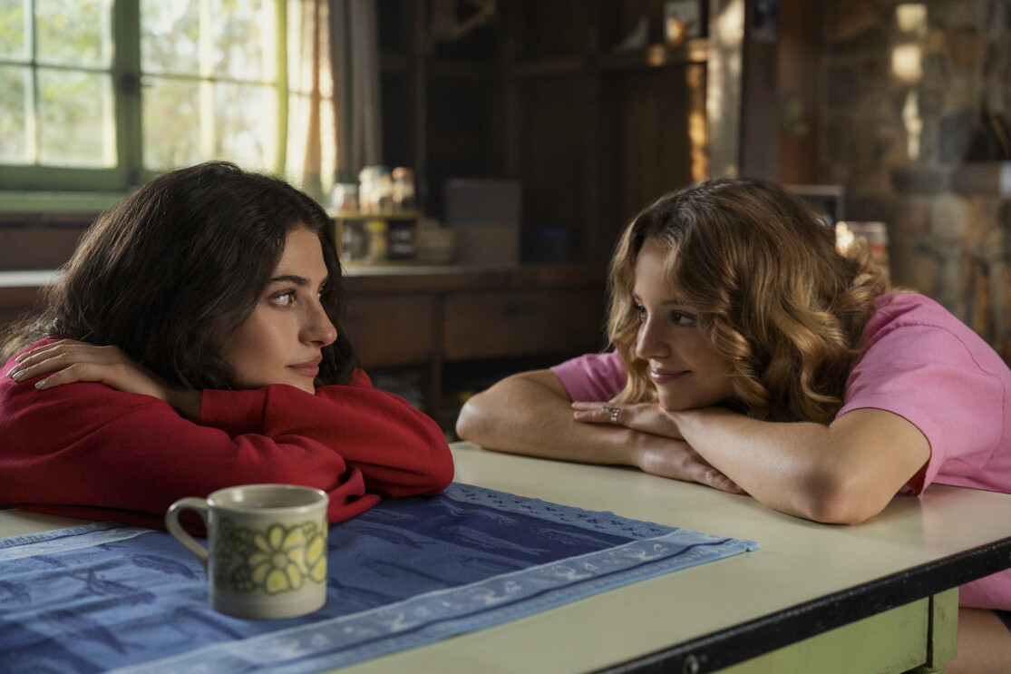 two girls staring at eachother
