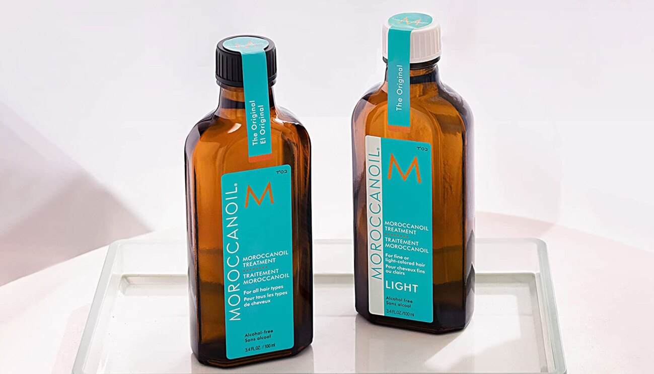 Image of two bottles of Moroccan Oil treatment.