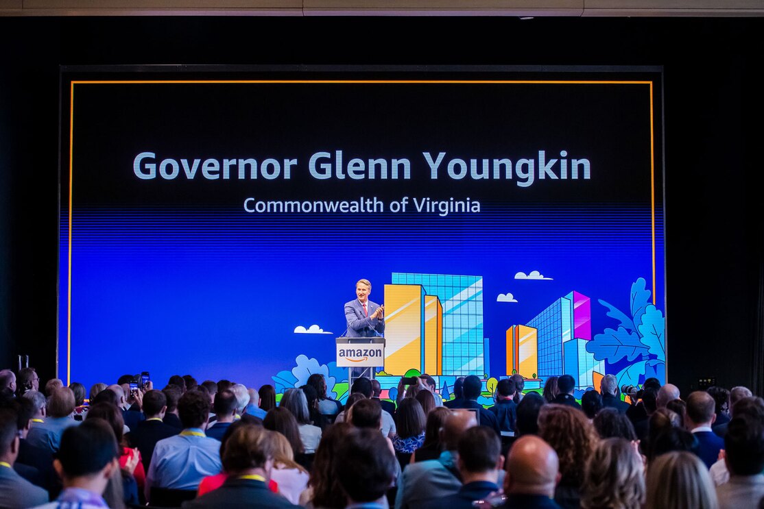 An image of local officials touring Amazon's second headquarters on its opening day