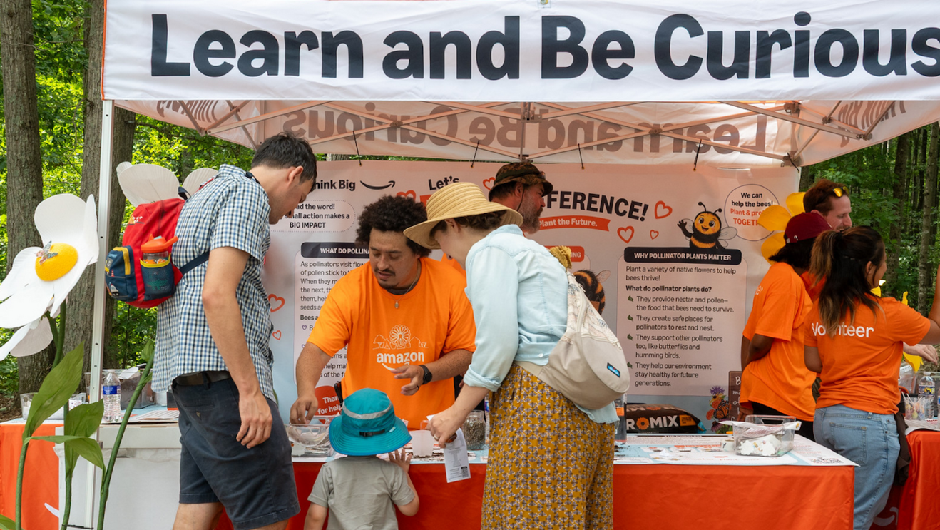 Locals interact with Amazon volunteers at the Louisa County Fair