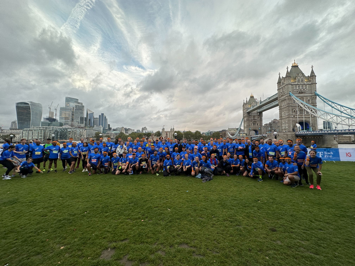 Amazon volunteers pose in front of Tower Bridge in London