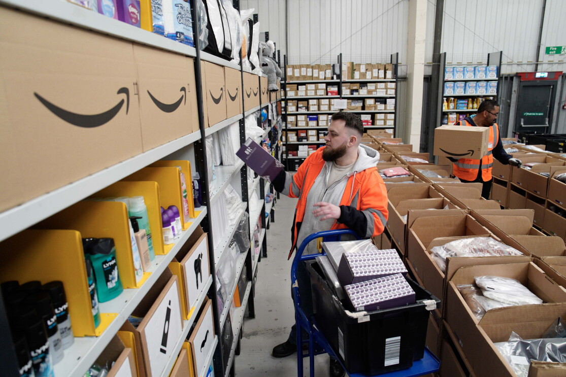 A man packs boxes at a Multibank