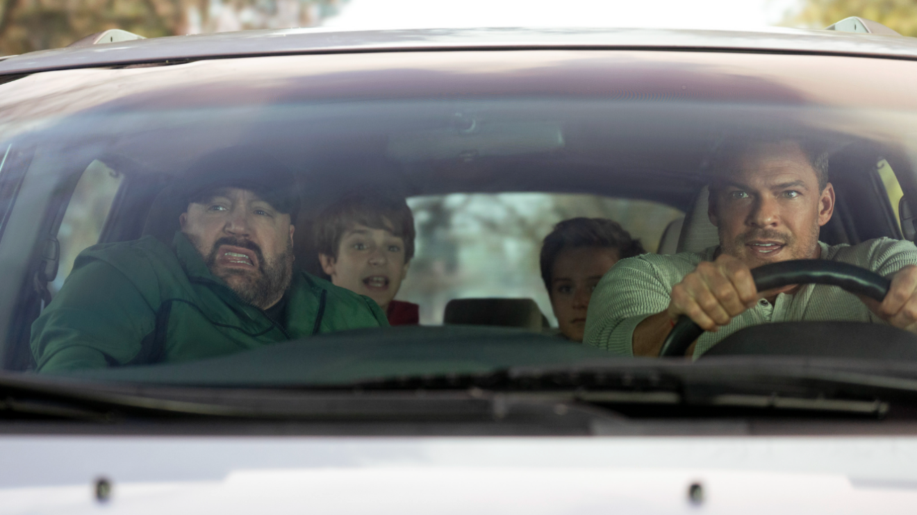 Chaotic scene inside vehicle with startled occupants; 'Playdate' movie