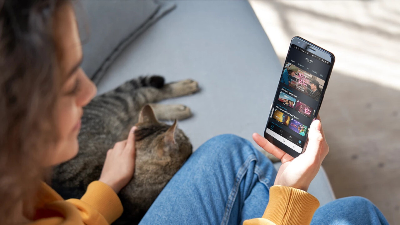 Lady watching prime on phone.jpg image