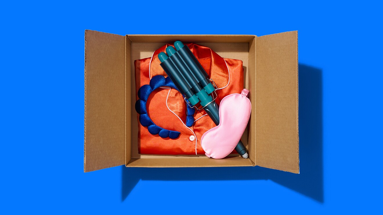 Assortment of colorful items packed in brown shipping box