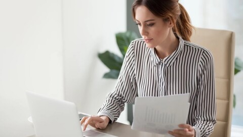 Image of woman working at a laptop computer