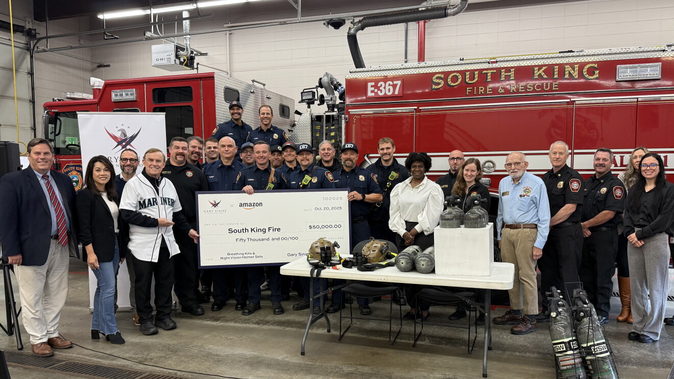 Fire department receives $50,000 donation check from Amazon