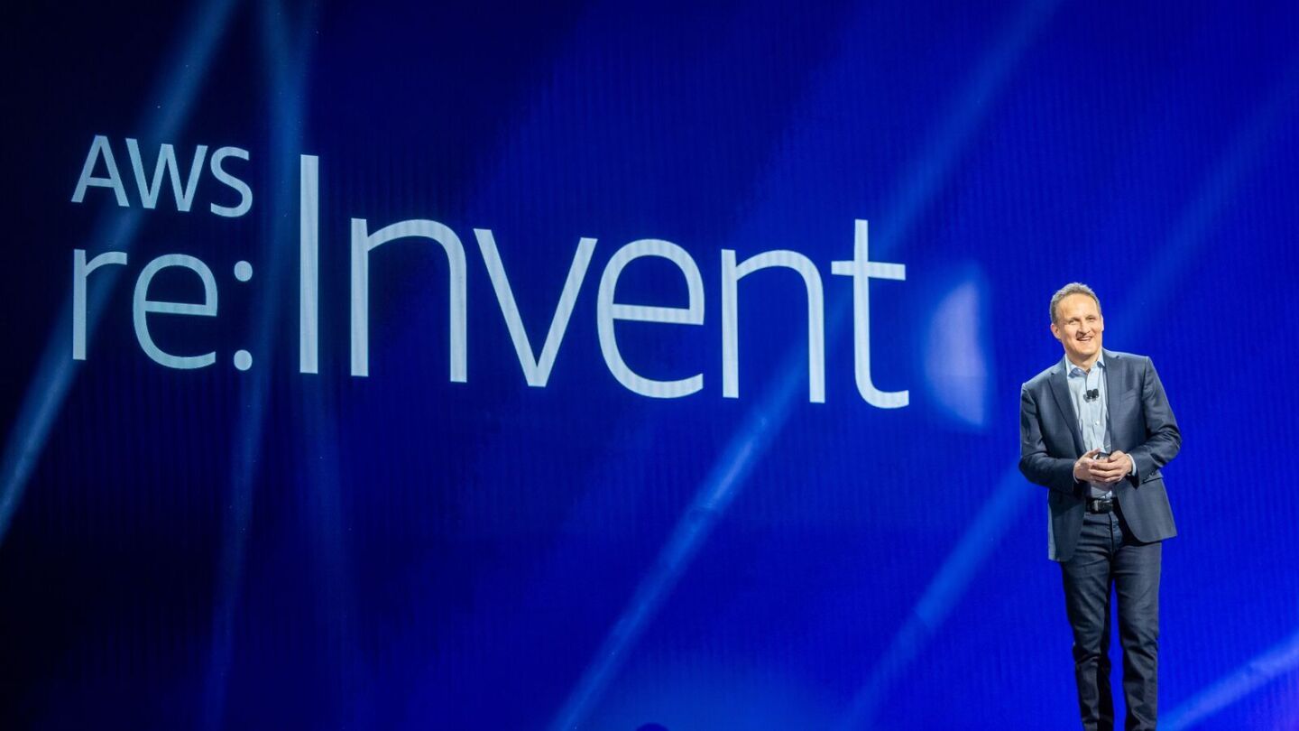 A photo of AWS CEO Adam Selipsky presenting on stage at AWS re:Invent 2023.