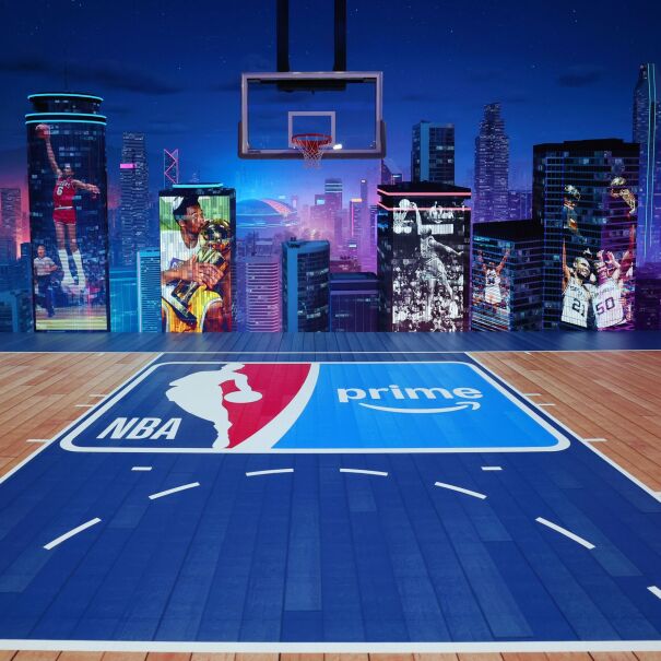 An image of a basketball court with the NBA and Prime Video logos on the floor