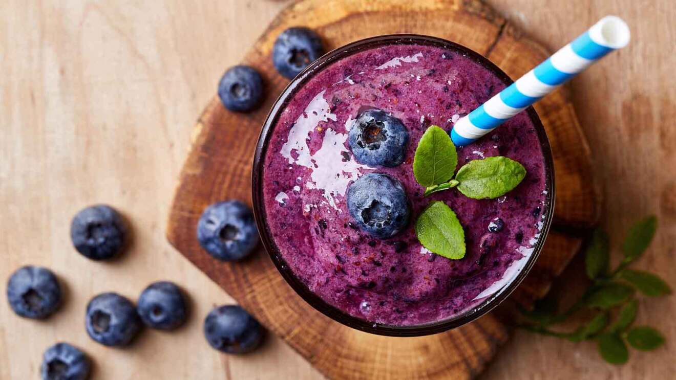 Prime Day 2023 live blog best deals: overhead image of a purple smoothie with blueberries.