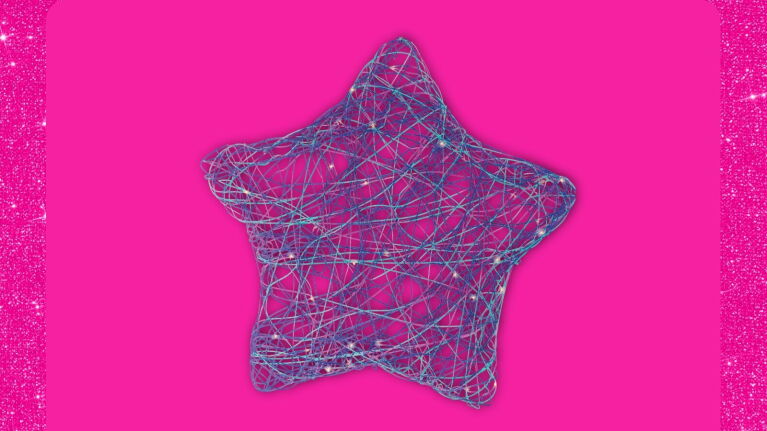 Wire star decoration on vibrant pink background