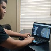 Amazon Future Engineer student learning computer science skills from home.