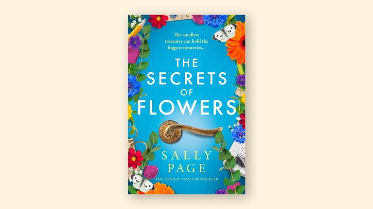Book cover: The Secrets of Flowers by Sally Page, surrounded by colorful blooms and a gold door handle
at the centre
