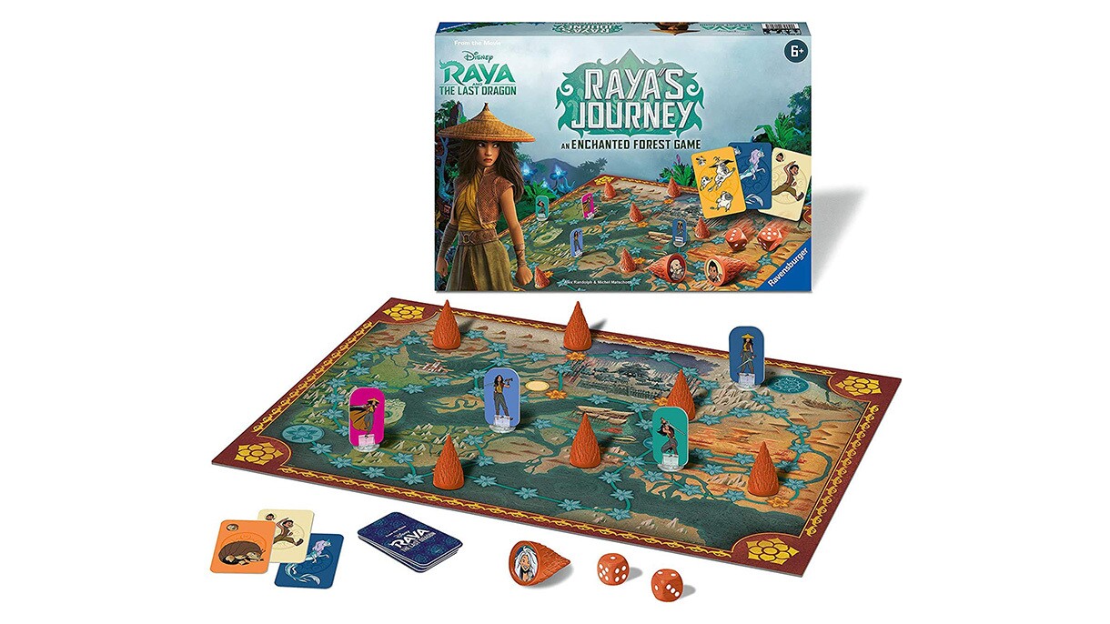 Animage of a board game and its accompanying box. The box shows the Disney character, Raya, and a landscape behind her.