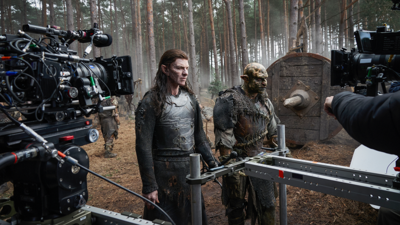 Camera crew filming fantasy TV show, with actors in elven costume