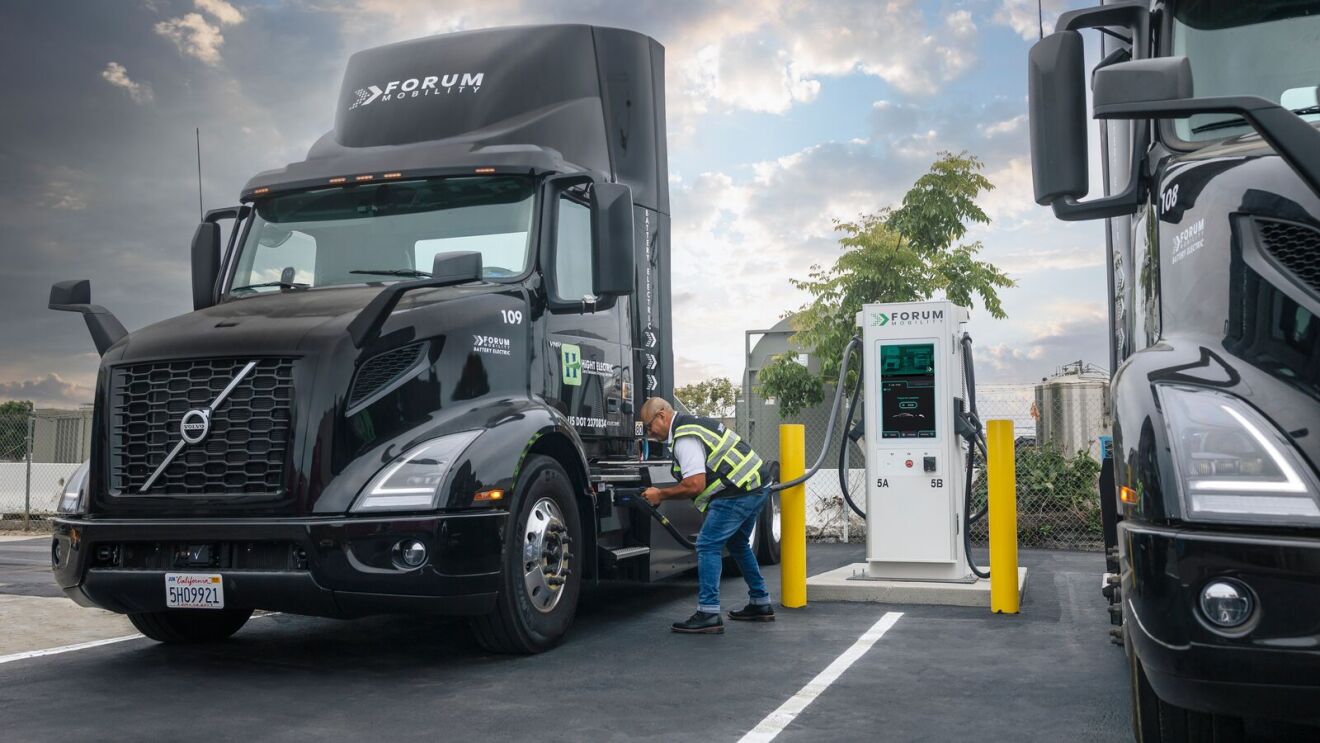 Forum delivery trucks being fueled up
