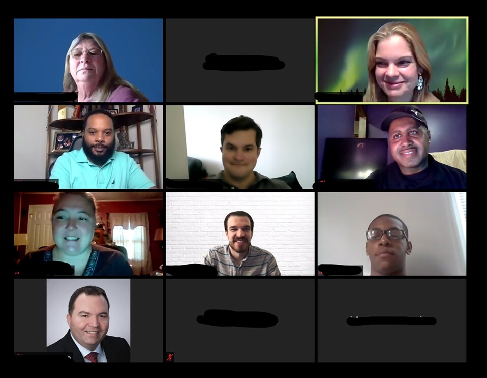 A Zoom call, showing more than a dozen individuals participating in AWS re/Start cloud education. 