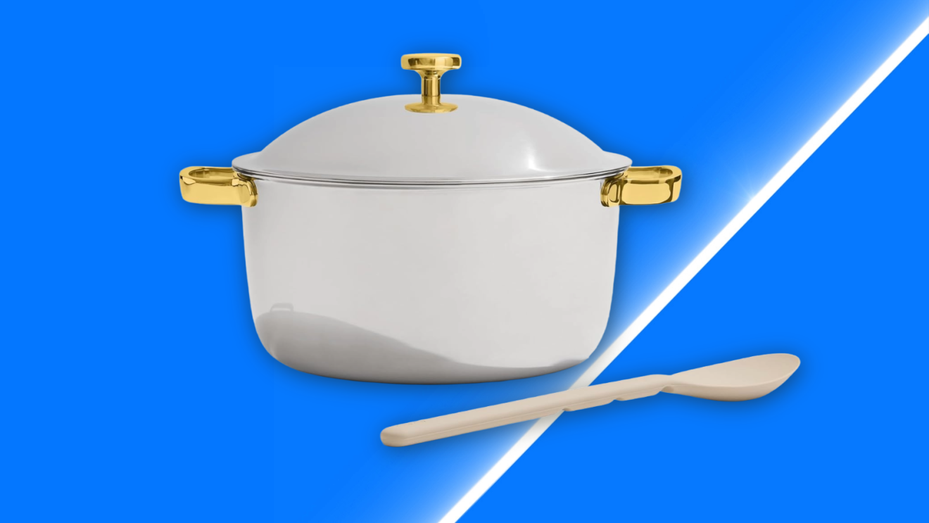 Stainless steel stockpot with gold handles and lid knob beside a wooden spoon for Amazon Prime Big Deal Days 2026