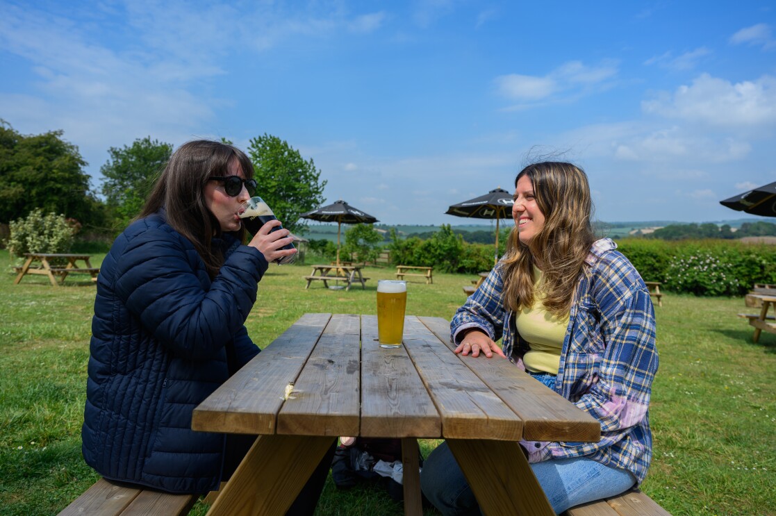 Enjoying a pint outside at The Farmer's Dog in Burford, Jeremy Clarkson's proper British pub from Clarkson's Farm season 4