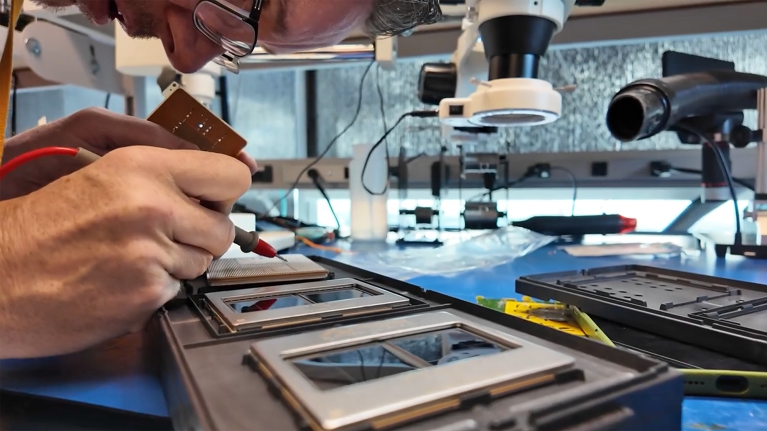 Trainium3 chips being built in a lab