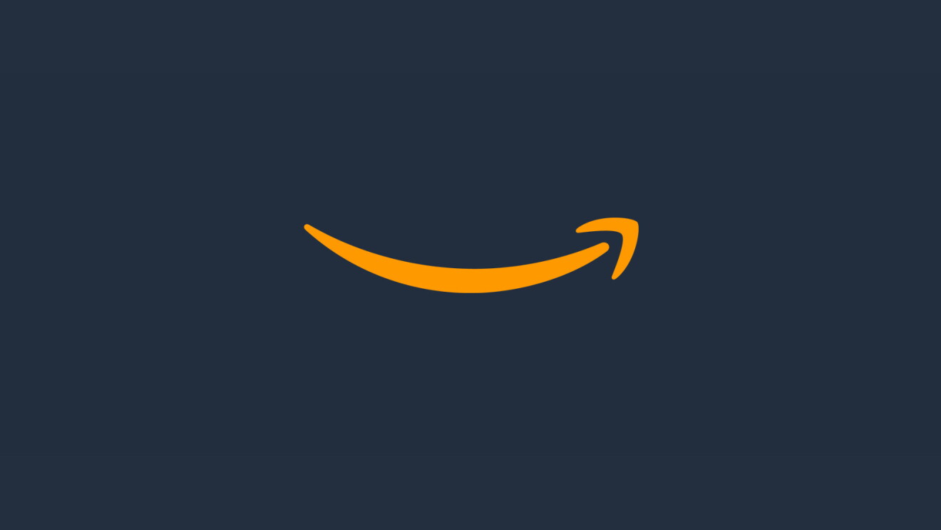 An orange Amazon smile on squid ink background