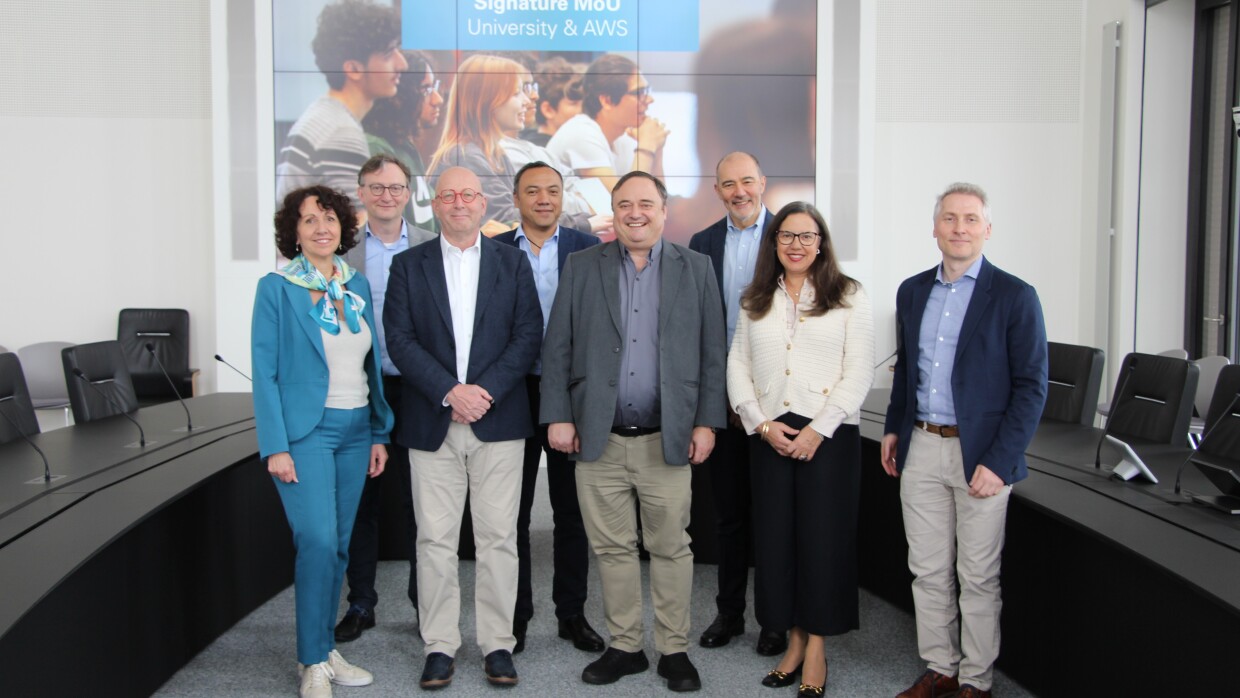 AWS and University of Luxembourg leaders after signing the MoU.