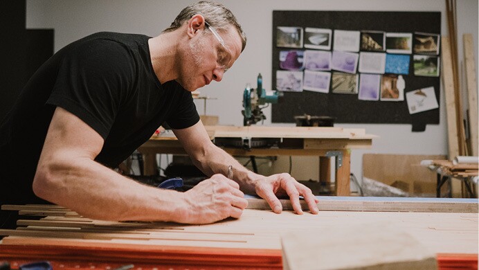 Artist from the Artist in Residence in program work on their respective art.