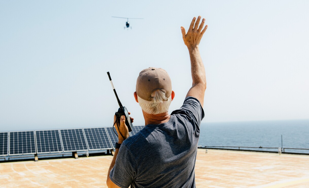 Images from the video of the process of delivering an Amazon package off the coast.