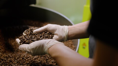 Coffee beans being roasted in Hook Coffee's roastery
