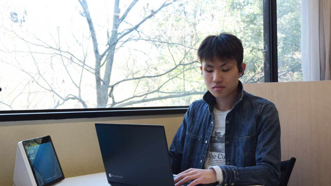 Young man on latptop