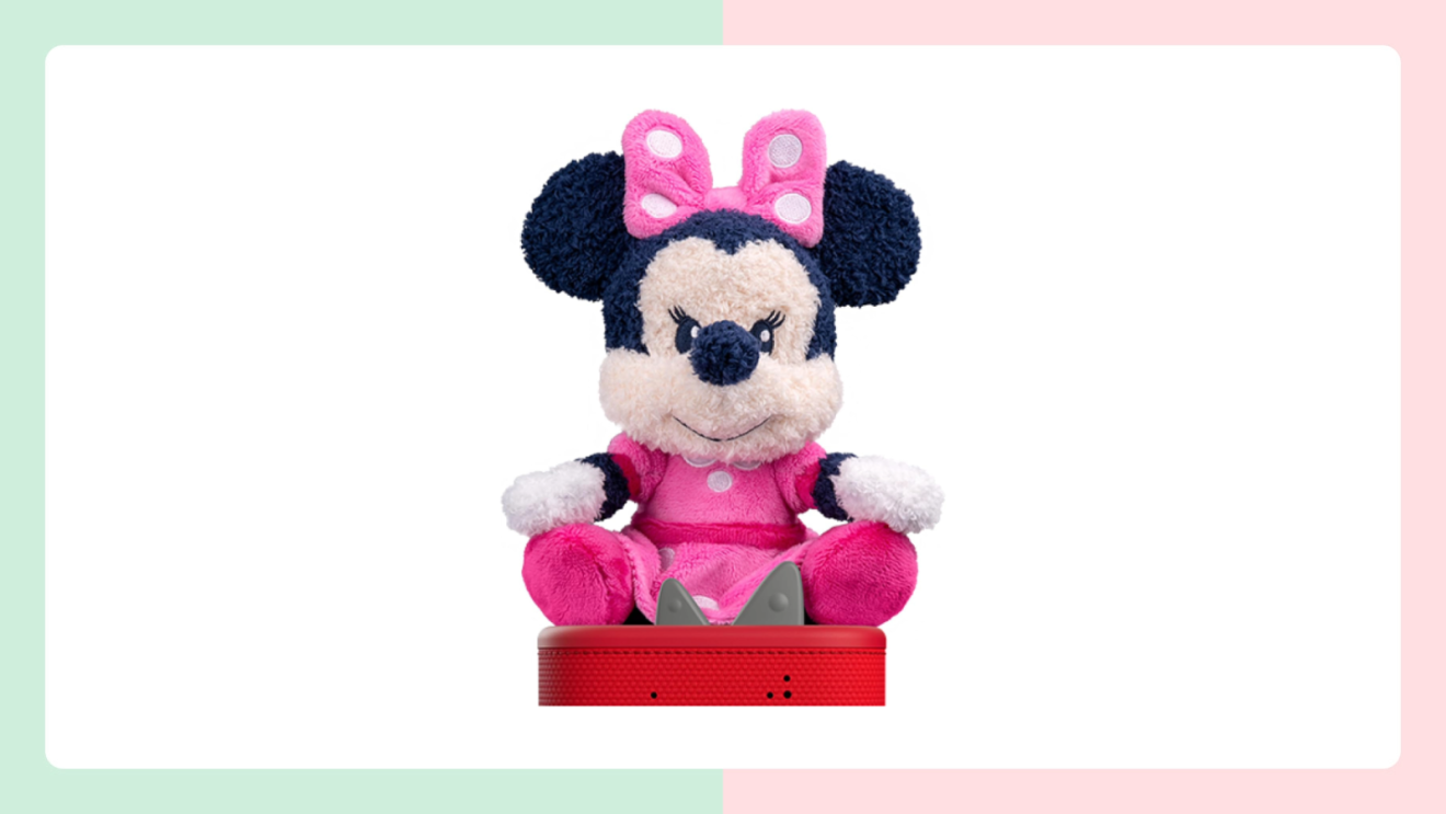 Minnie Mouse plush toy sitting on a Tonies red smart speaker