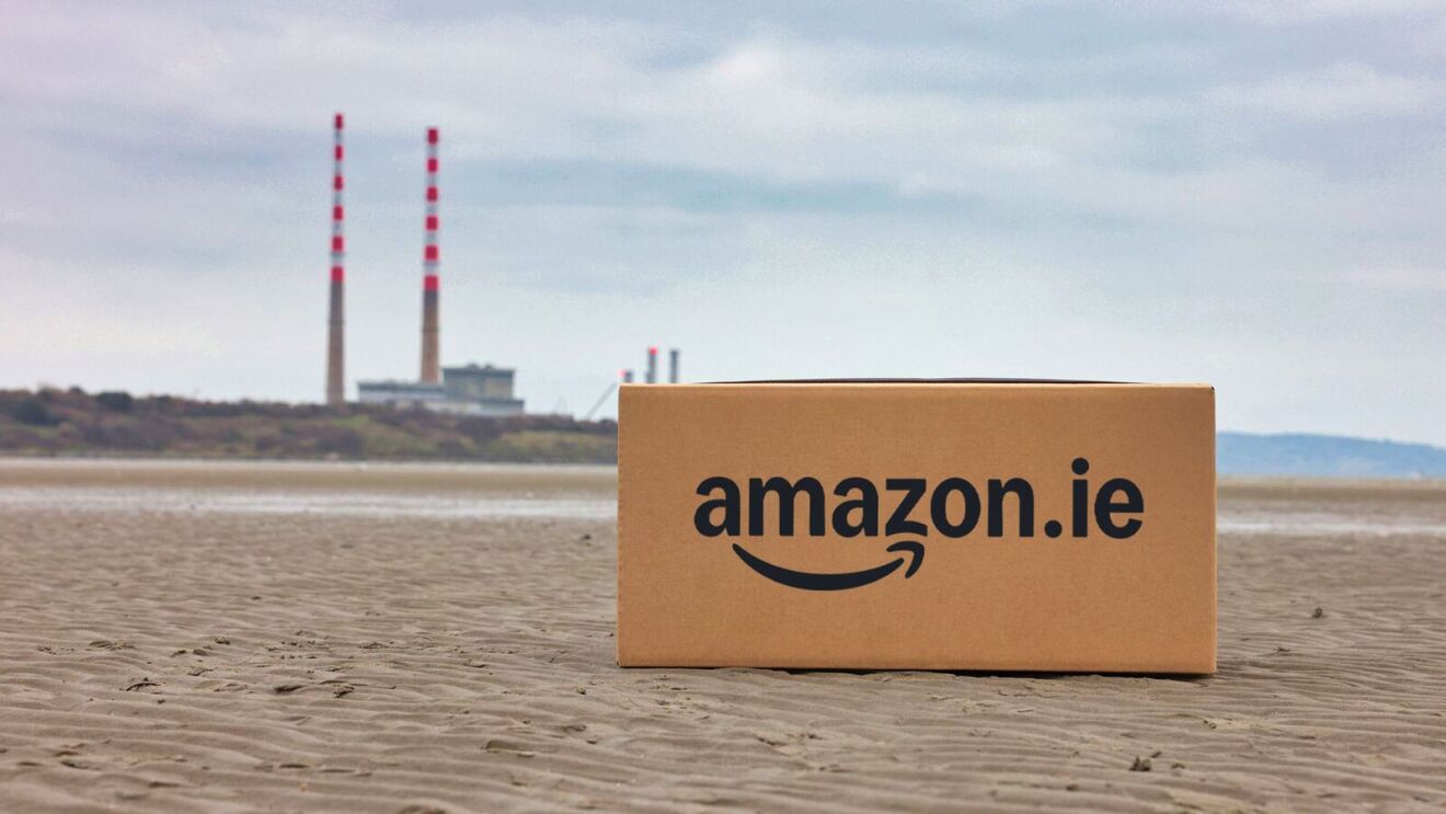 Amazon.ie delivery box resting on Irish coastline near factory