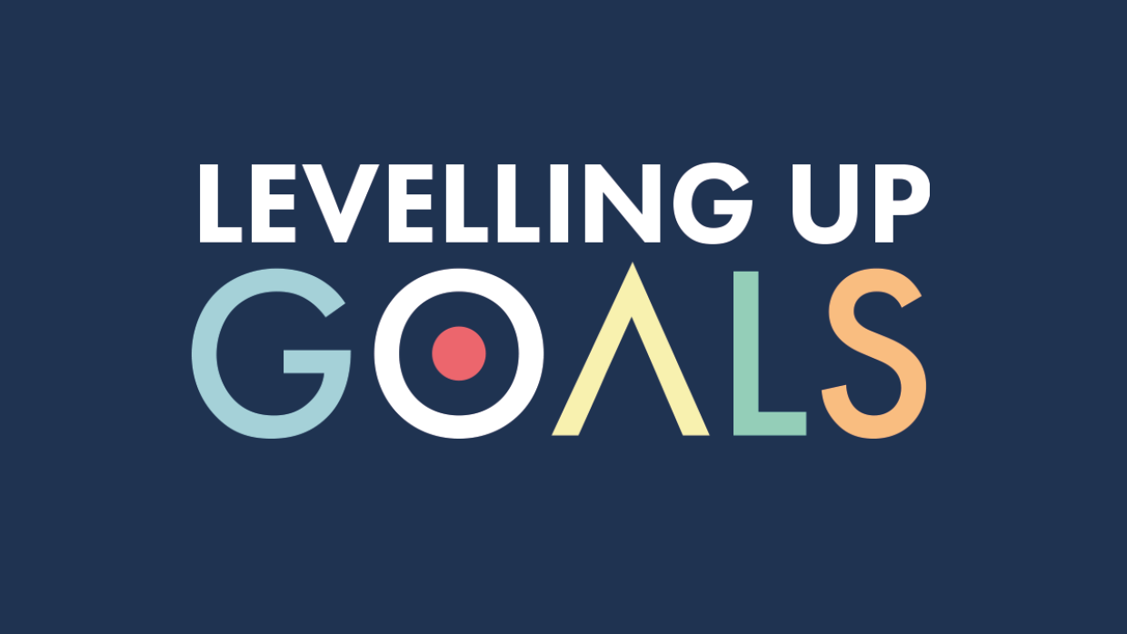 A navy background with text on it that says "Levelling up, GOALS"