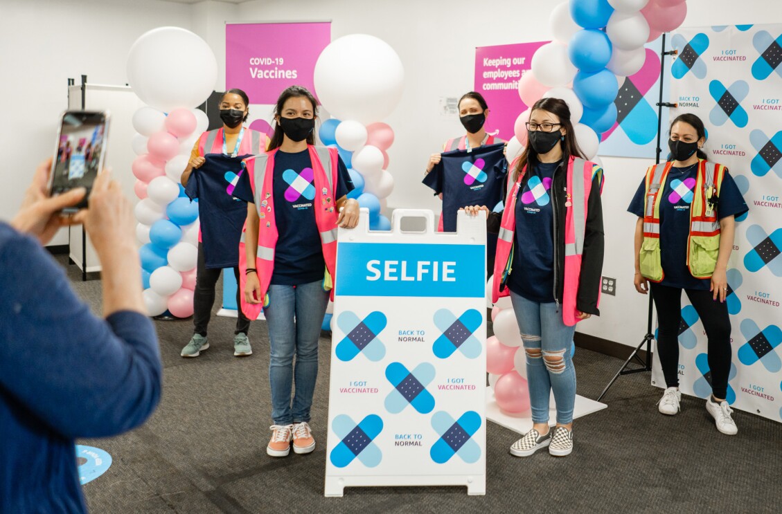 Amazon employee at a COVID-19 vaccination event
