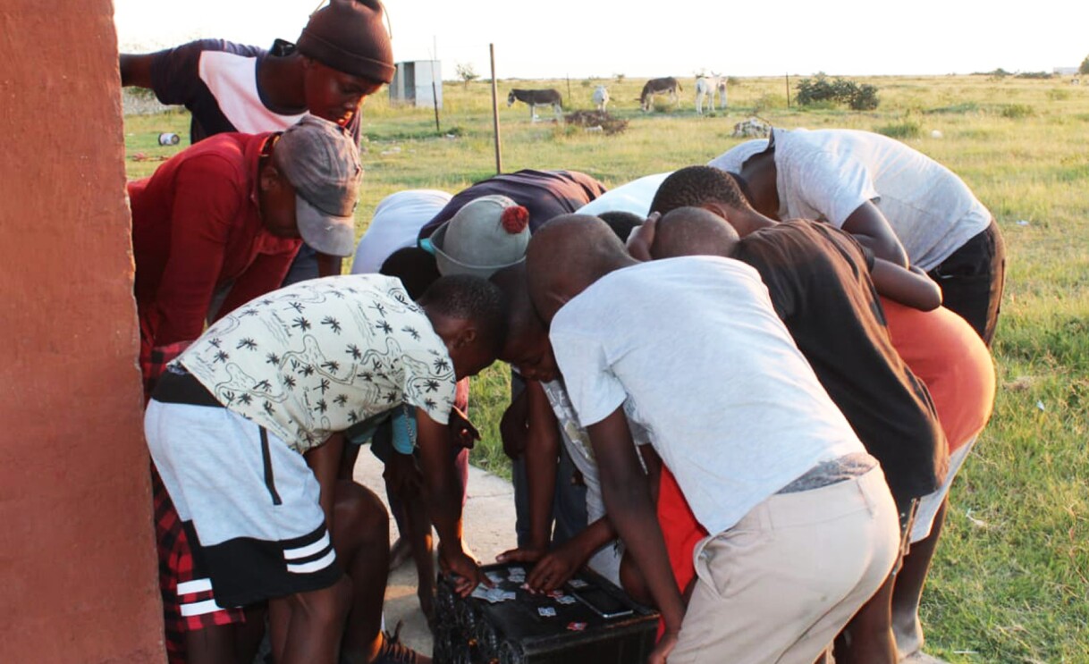 An image of students learning coding skills.