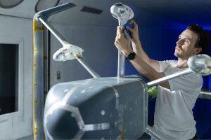 A man working on an Amazon drone.