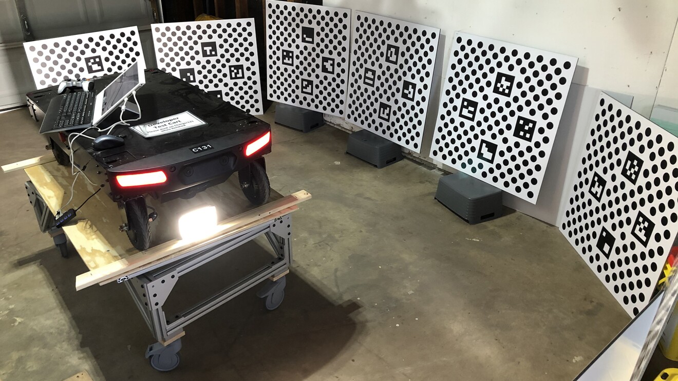 Amazon employee working on robotics advancement from his garage during the pandemic