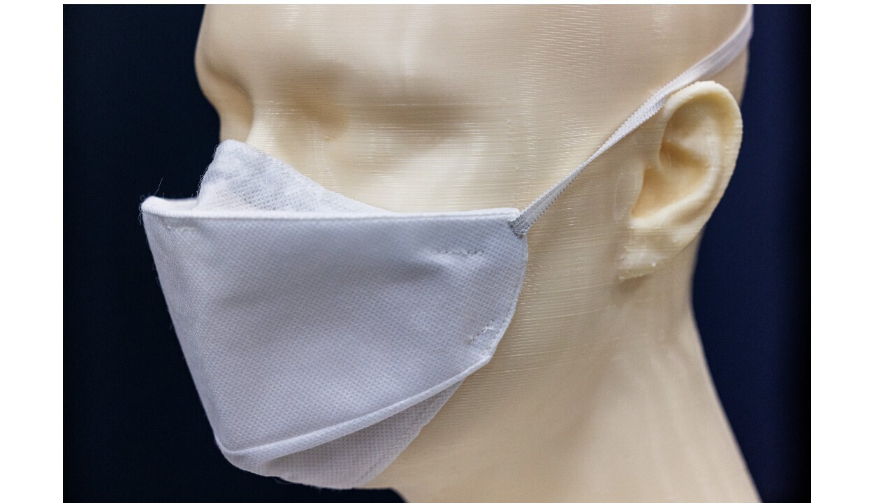 A mannequin wears one of the final mask prototypes.