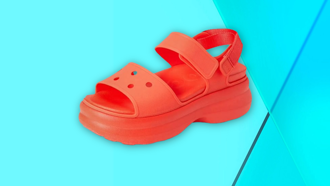 Red platform sandal with velcro strap on turquoise background