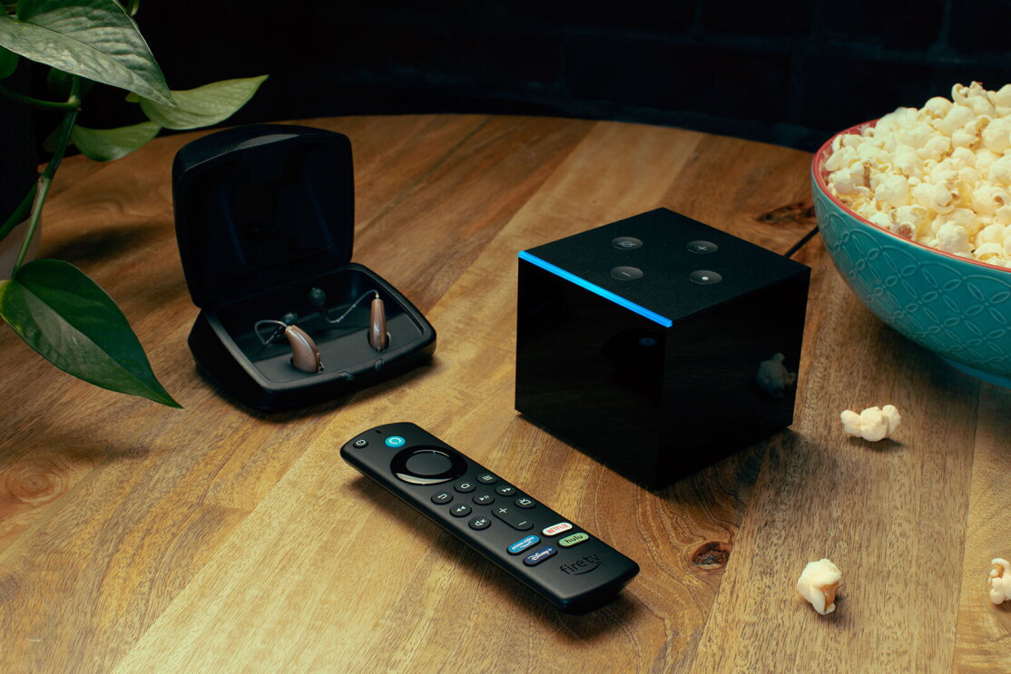 An image of hearing aids for the Fire TV alongside a Fire TV device and remote.